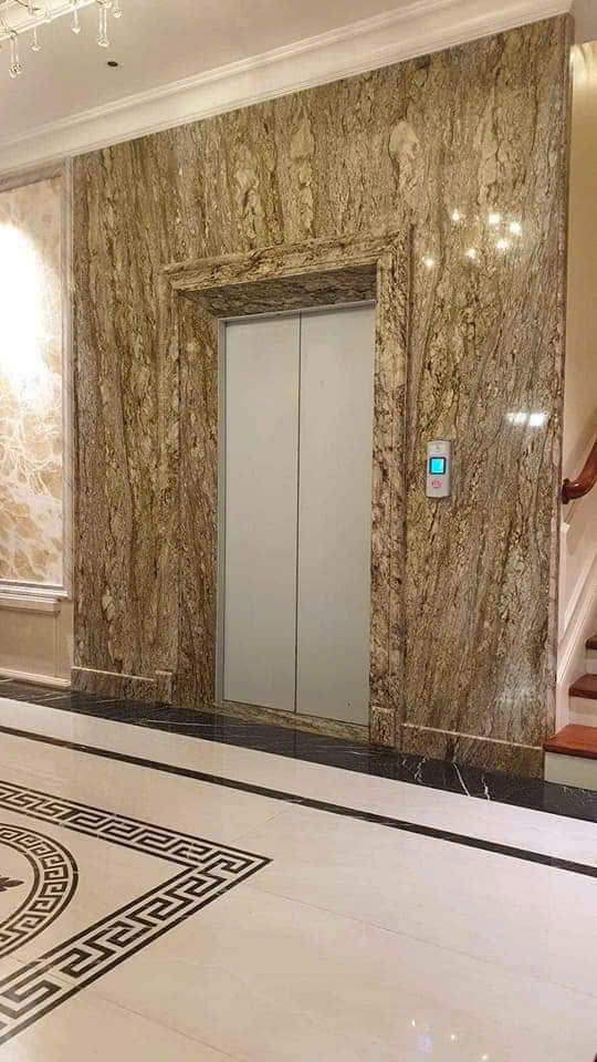 Cho thuê nhà hai cửa đi, mới, thang máy, 100m2_ 4T; vỉa hè, Lò Đúc-32 Tr