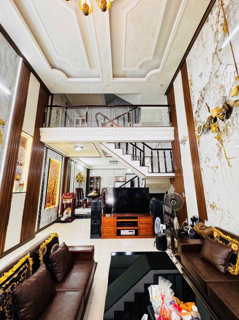 Bán nhà ĐẸP 100m² 3 Tầng Dĩ An,SHR đường nhựa 2 ô tô,gần Vincom Dĩ An